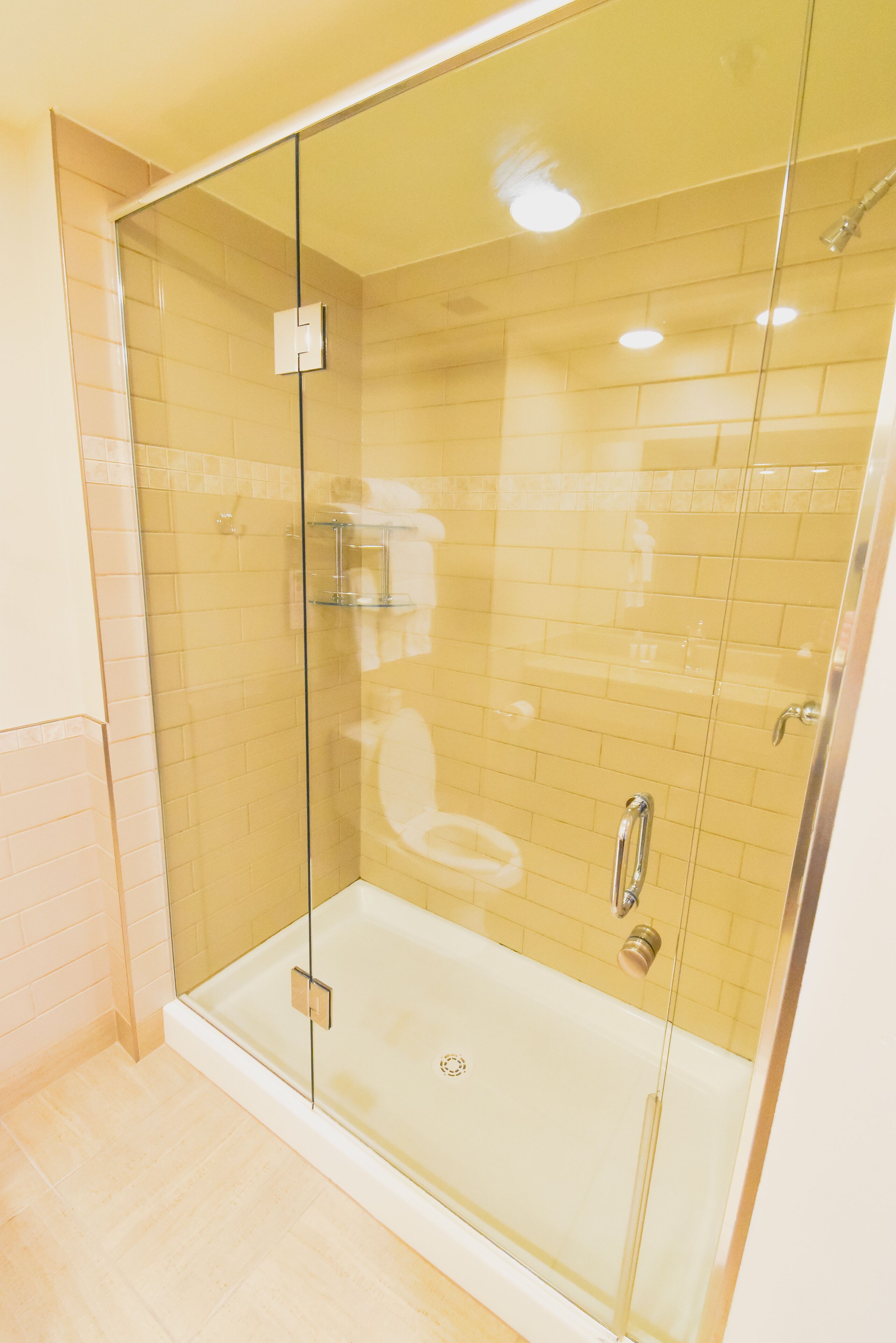 executive suite | bathroom | hair dryer, towels