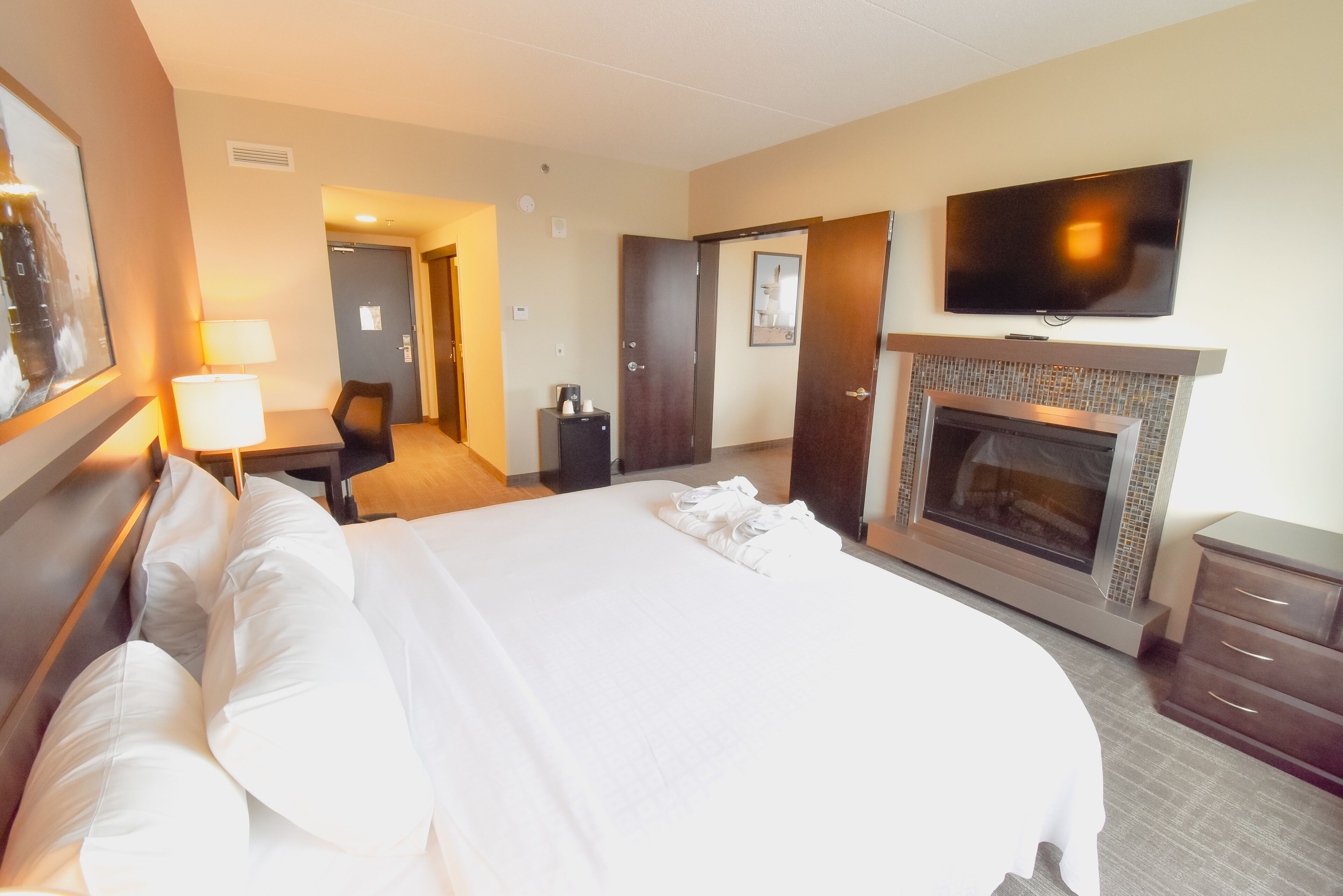 executive suite | premium bedding, desk, blackout curtains, soundproofing