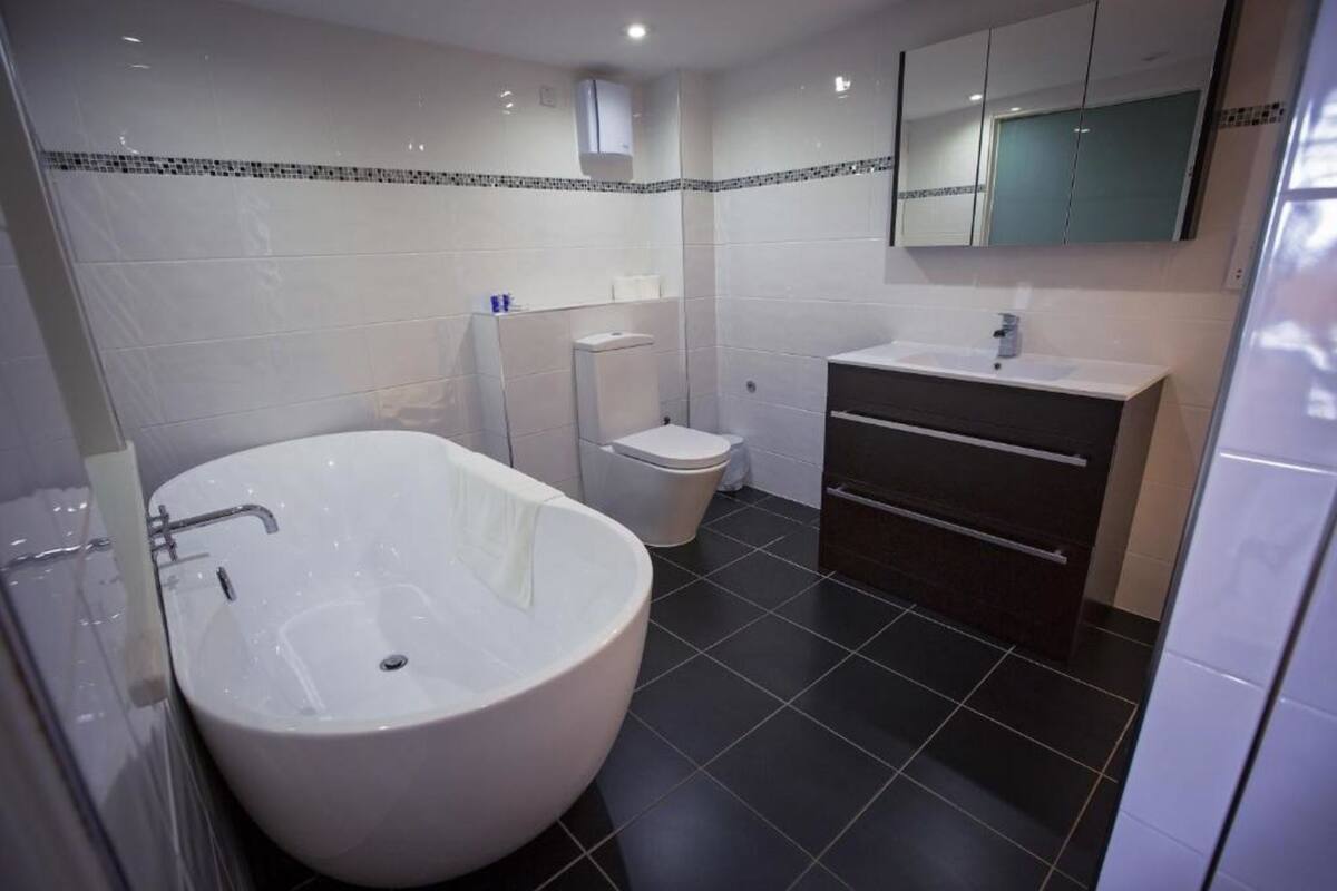 junior suite, 1 double bed, hot tub, sea view | bathroom | free toiletries, hair dryer, towels, soap