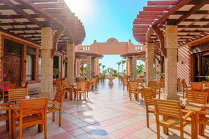 3 bars/lounges, poolside bar, beach bar