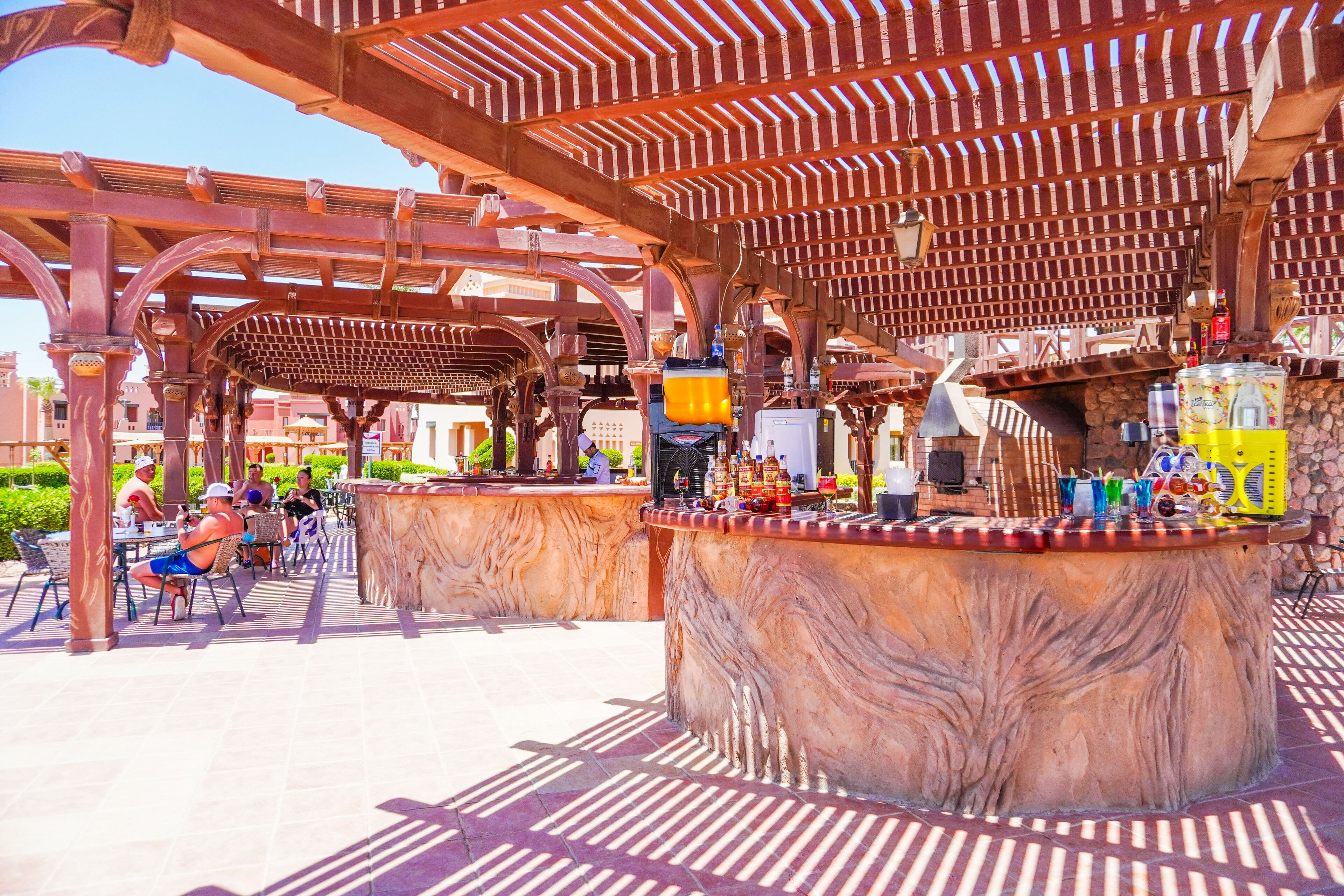 3 bars/lounges, poolside bar, beach bar
