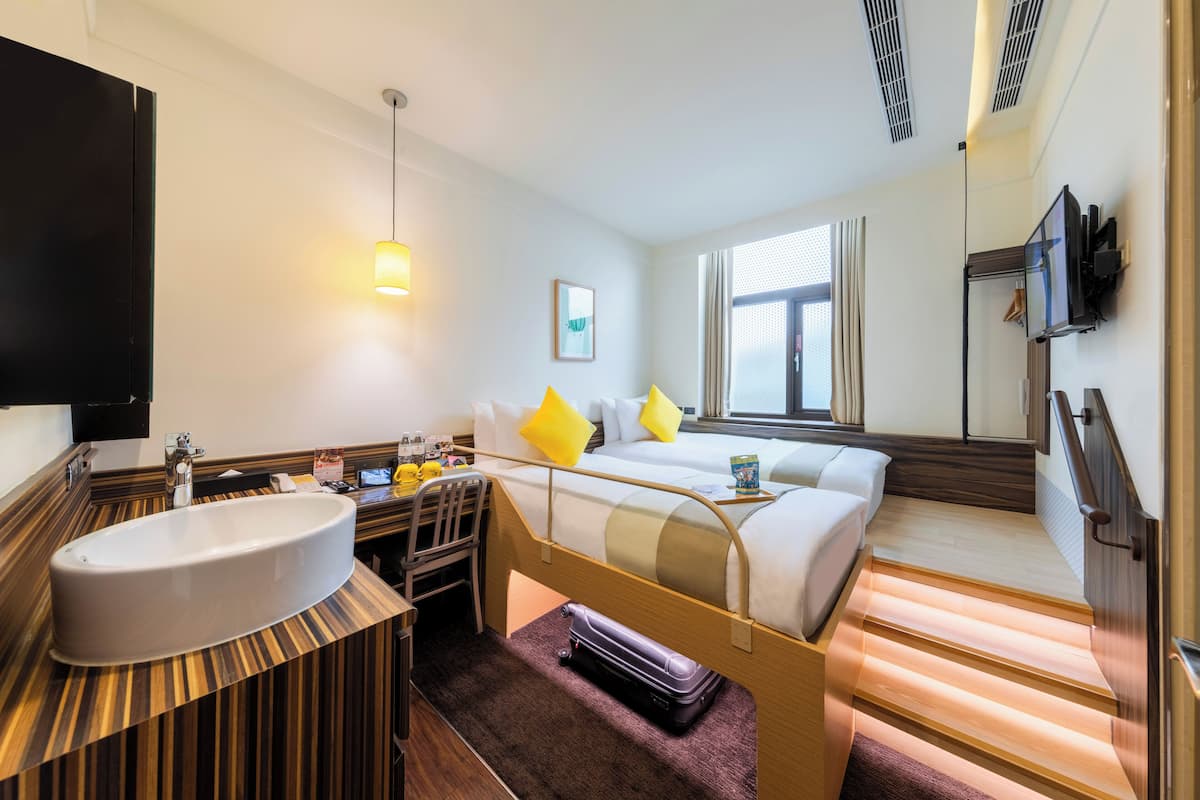 Standard Twin Room, 2 Twin Beds | Down comforters, pillowtop beds, in-room safe, individually decorated