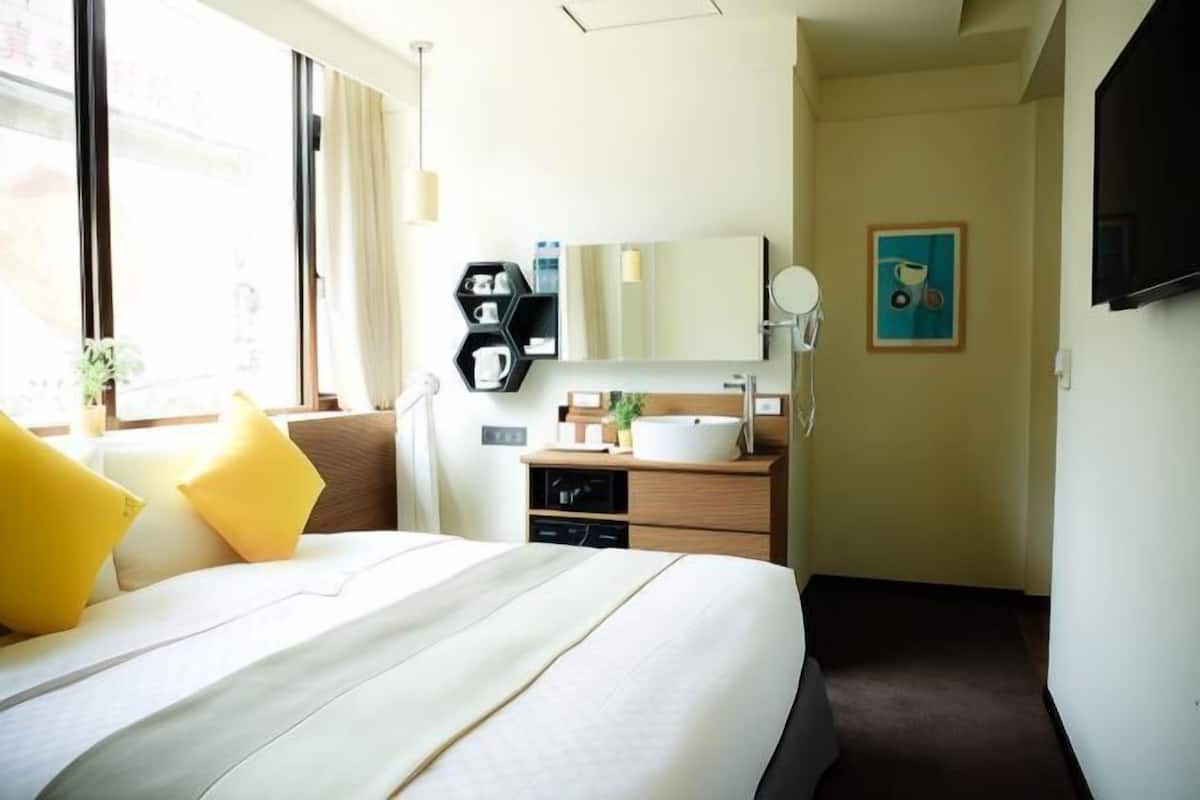 Down comforters, pillowtop beds, in-room safe, desk