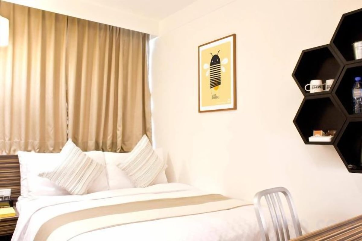Down comforters, pillowtop beds, in-room safe, desk