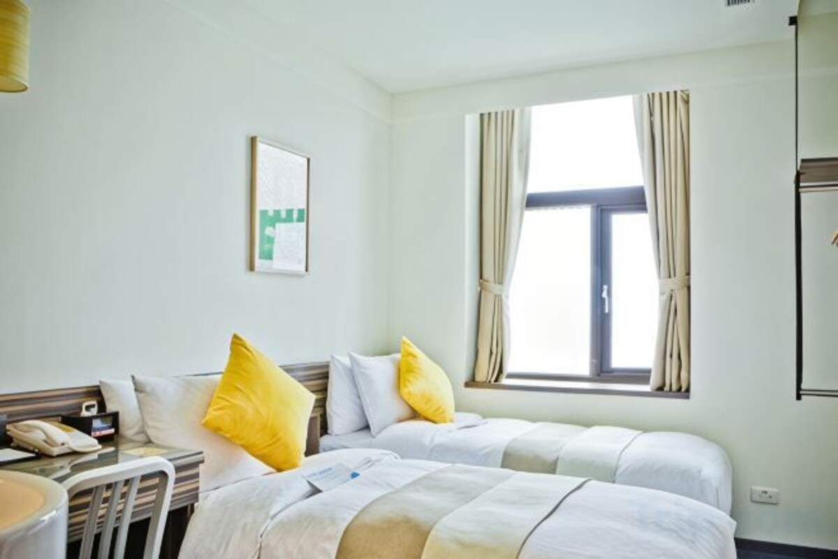 Down comforters, pillowtop beds, in-room safe, desk
