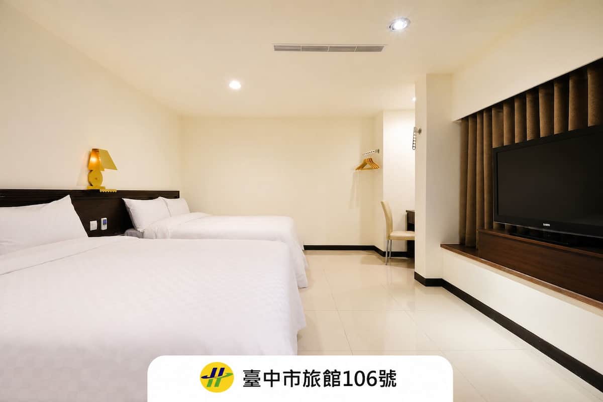 Habitación cuádruple superior, 2 camas matrimoniales | Ropa de cama de alta calidad, edredón, escritorio y wifi gratis