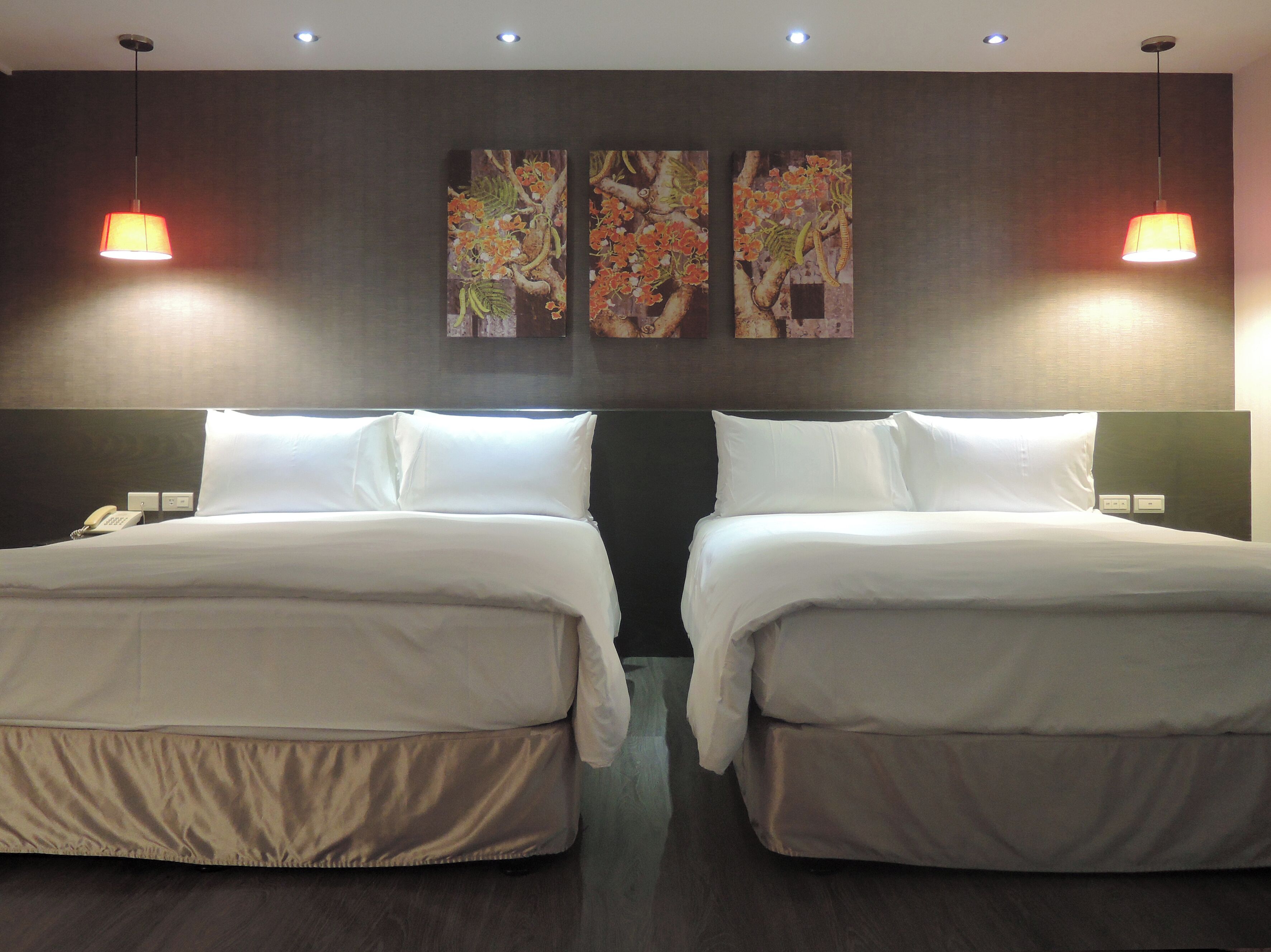 Family Quadruple Room | Down comforters, in-room safe, individually decorated