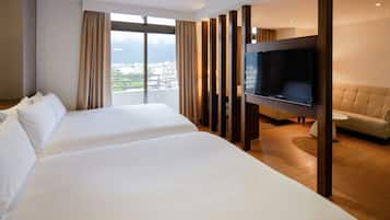 Family Quadruple Room | Down comforters, in-room safe, individually decorated