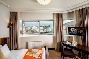Pillow-top beds, minibar, in-room safe, desk