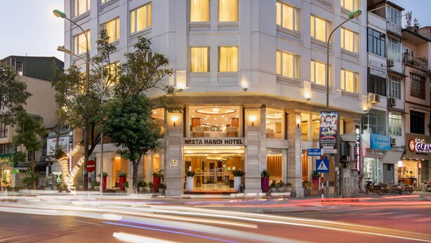 A multi-story hotel with a prominent sign reading "NESTA HOTEL" at the top. -  Nesta Hotel Ha Noi (Hanoi)