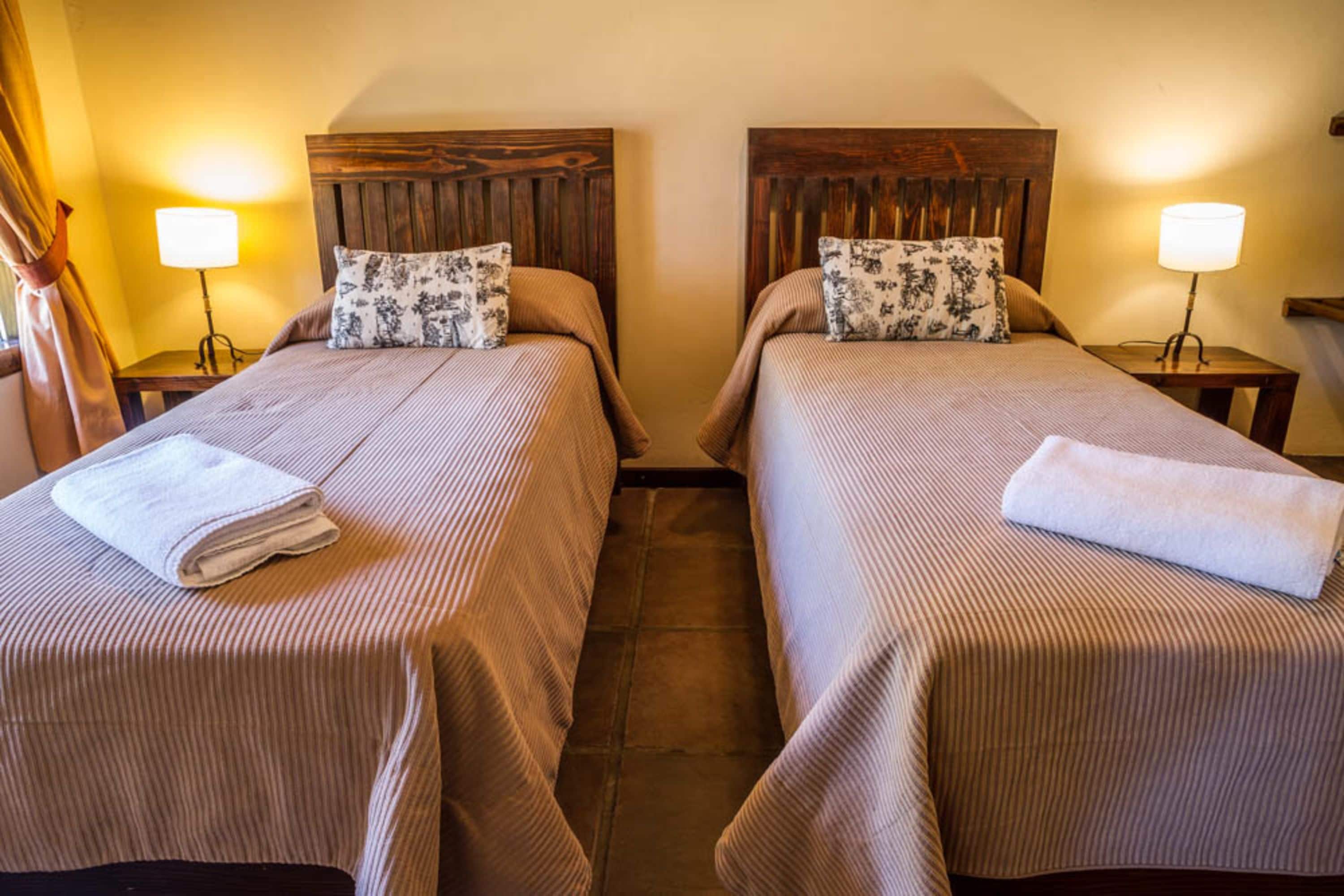 bungalow, 2 bedrooms | in-room safe, blackout curtains, bed sheets