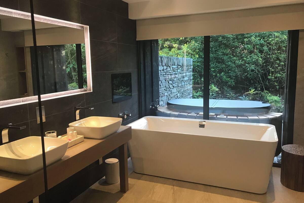 wild garden hot tub suite | bathroom | free toiletries, hair dryer, bathrobes, slippers