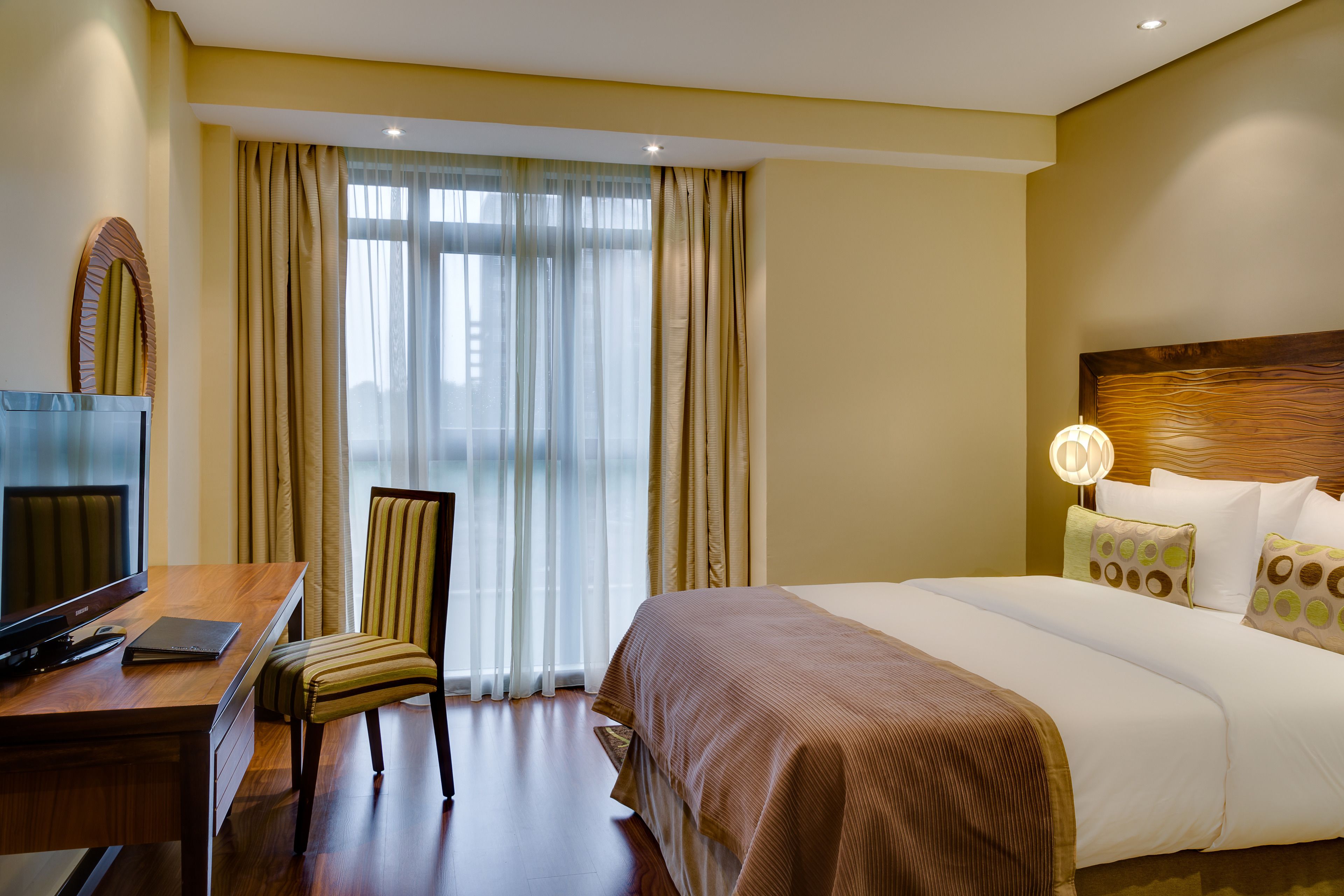 premium bedding, down duvets, minibar, in-room safe