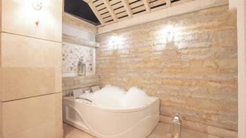 Luxury Suite, 1 Bedroom | Bathroom | Hair dryer, bathrobes, slippers, towels