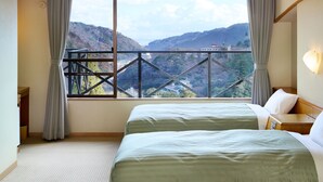 A hotel room with two beds, a large window with a view of a mountainous landscape, and a balcony with a metal railing. - Hakonenomori Okada (Hakone)