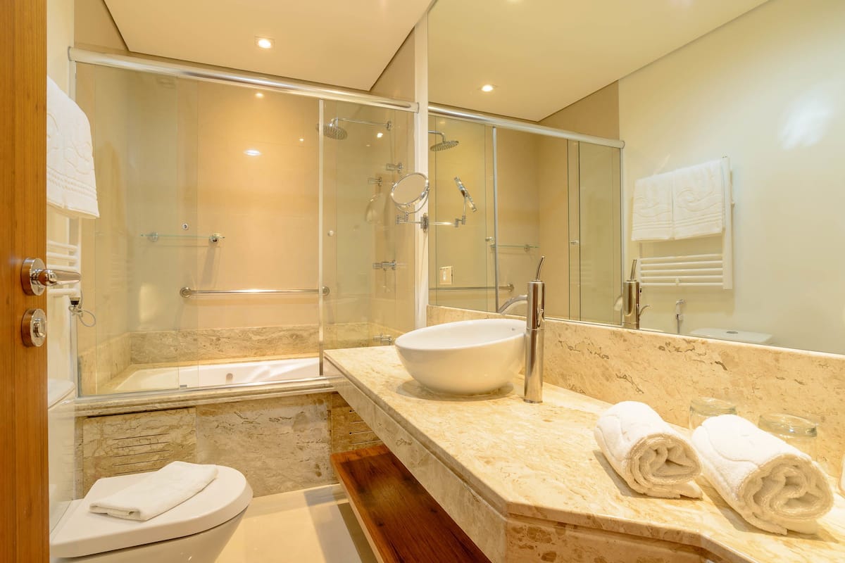 prestige suite | bathroom | designer toiletries, hair dryer, heated floors, towels