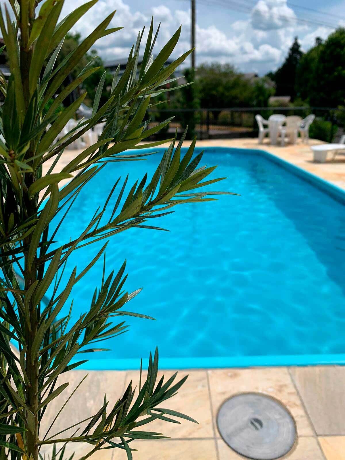 outdoor pool, pool umbrellas, pool loungers