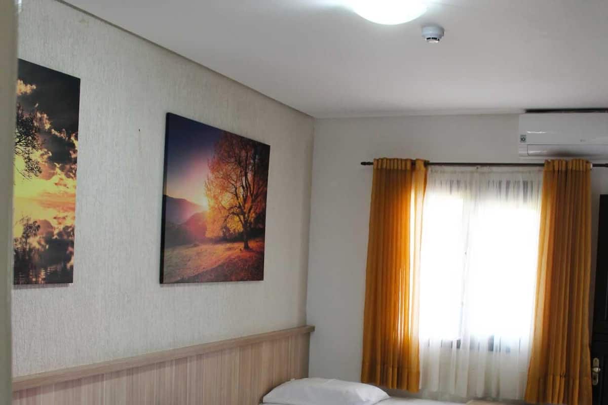 Minibar, blackout drapes, iron/ironing board, free WiFi