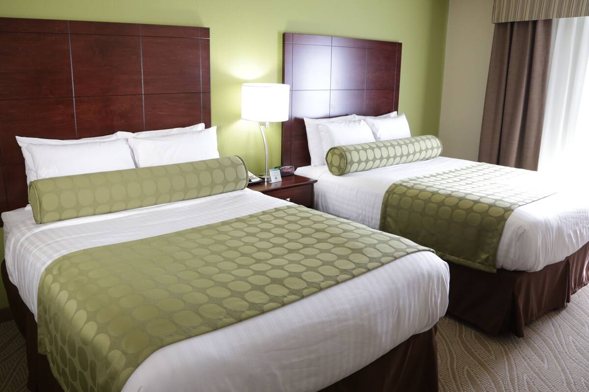 Premium bedding, down comforters, pillowtop beds, in-room safe