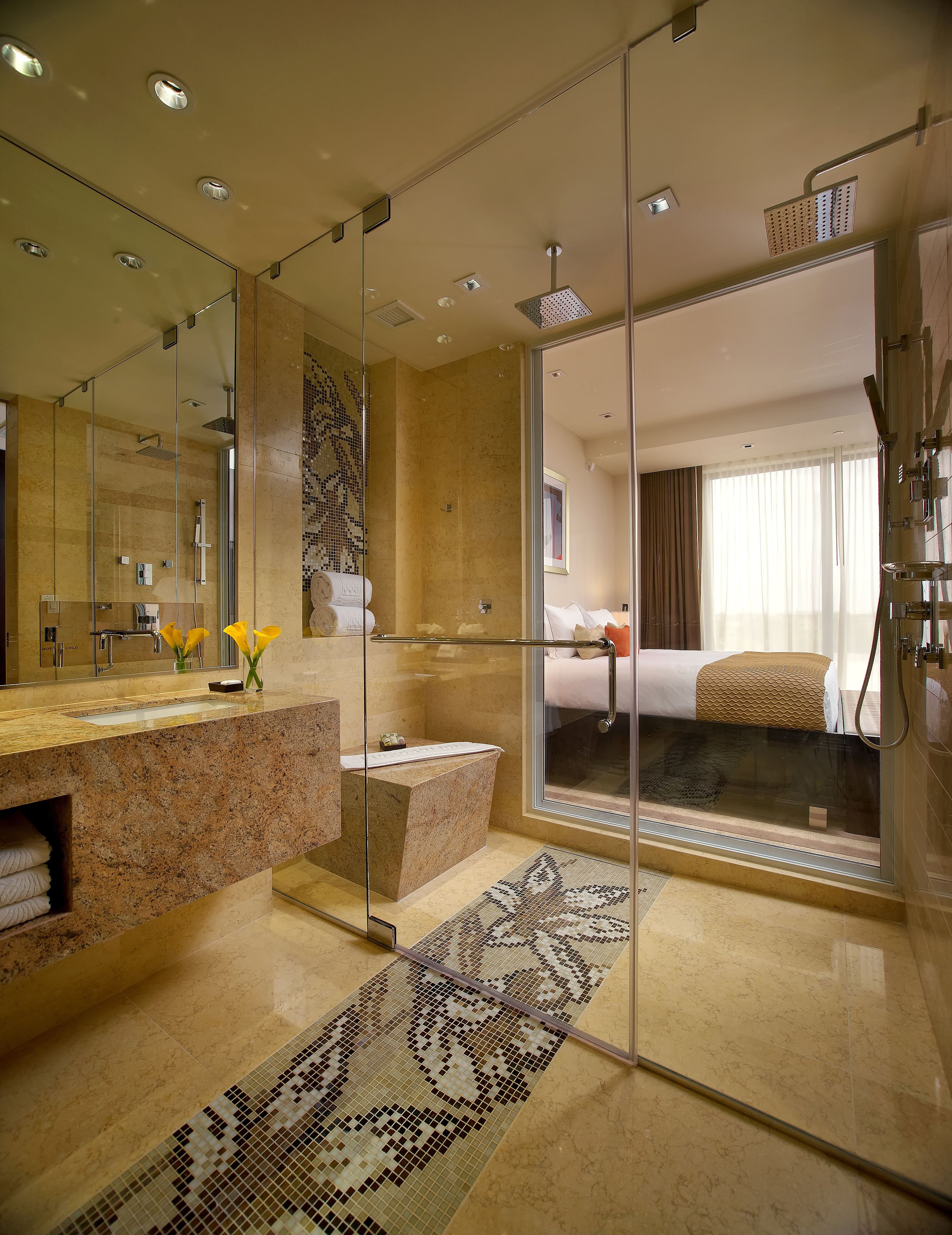 rainfall showerhead, designer toiletries, hair dryer, bathrobes