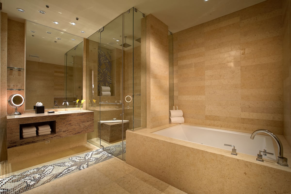 master suite  | bathroom | rainfall showerhead, designer toiletries, hair dryer, bathrobes