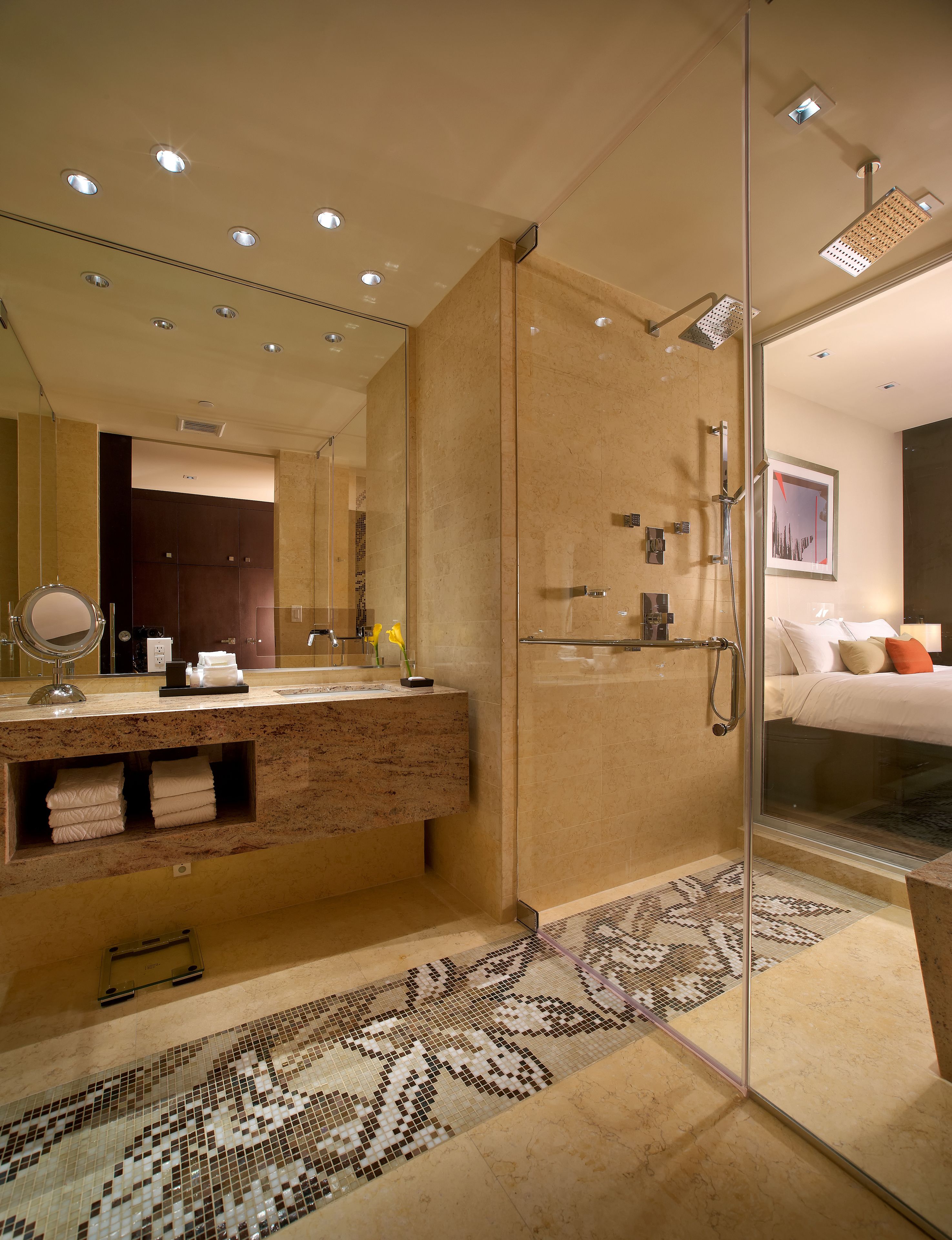 rainfall showerhead, designer toiletries, hair dryer, bathrobes