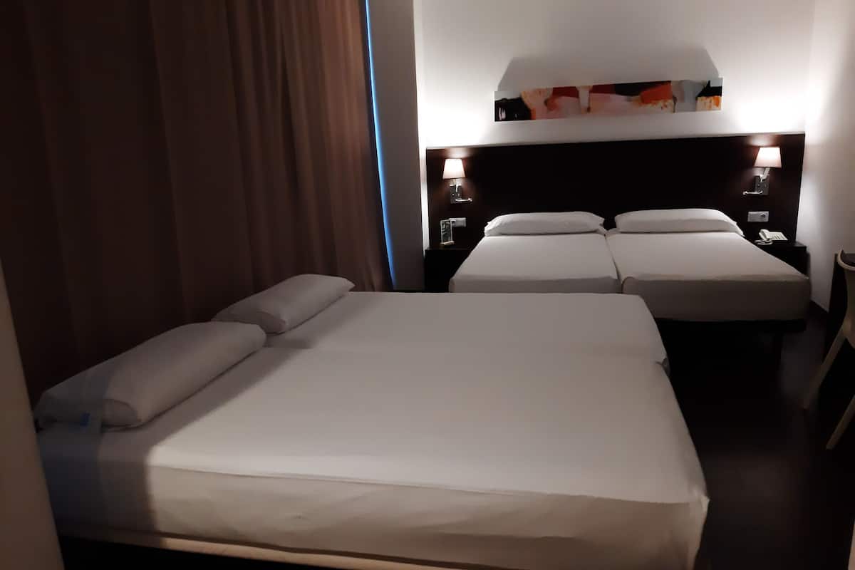 classic quadruple room | 1 bedroom, down duvets, in-room safe, desk