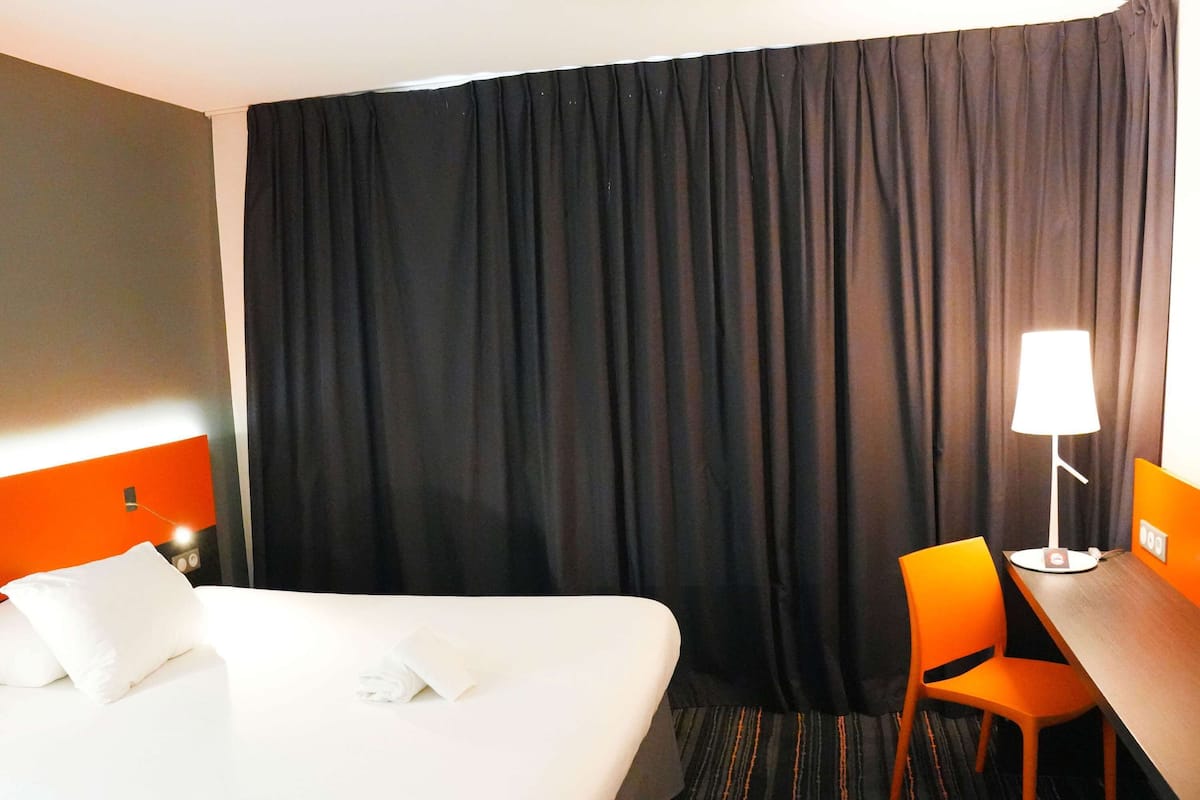 Premium bedding, memory foam beds, in-room safe, desk