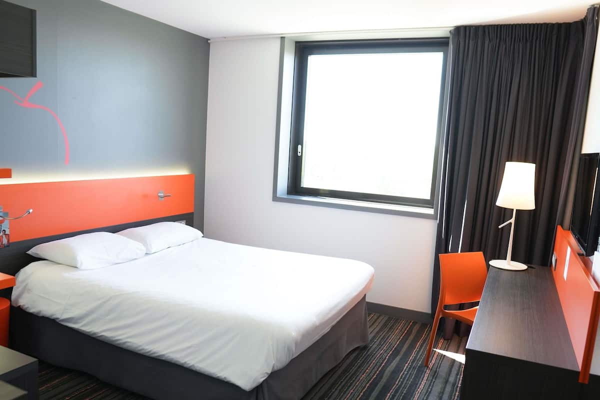 Premium bedding, memory-foam beds, in-room safe, desk