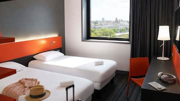 Premium bedding, memory foam beds, in-room safe, desk