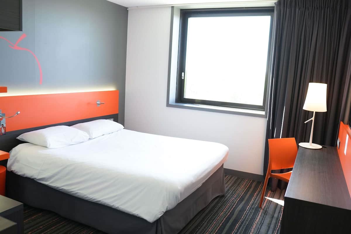 Premium bedding, memory foam beds, in-room safe, desk