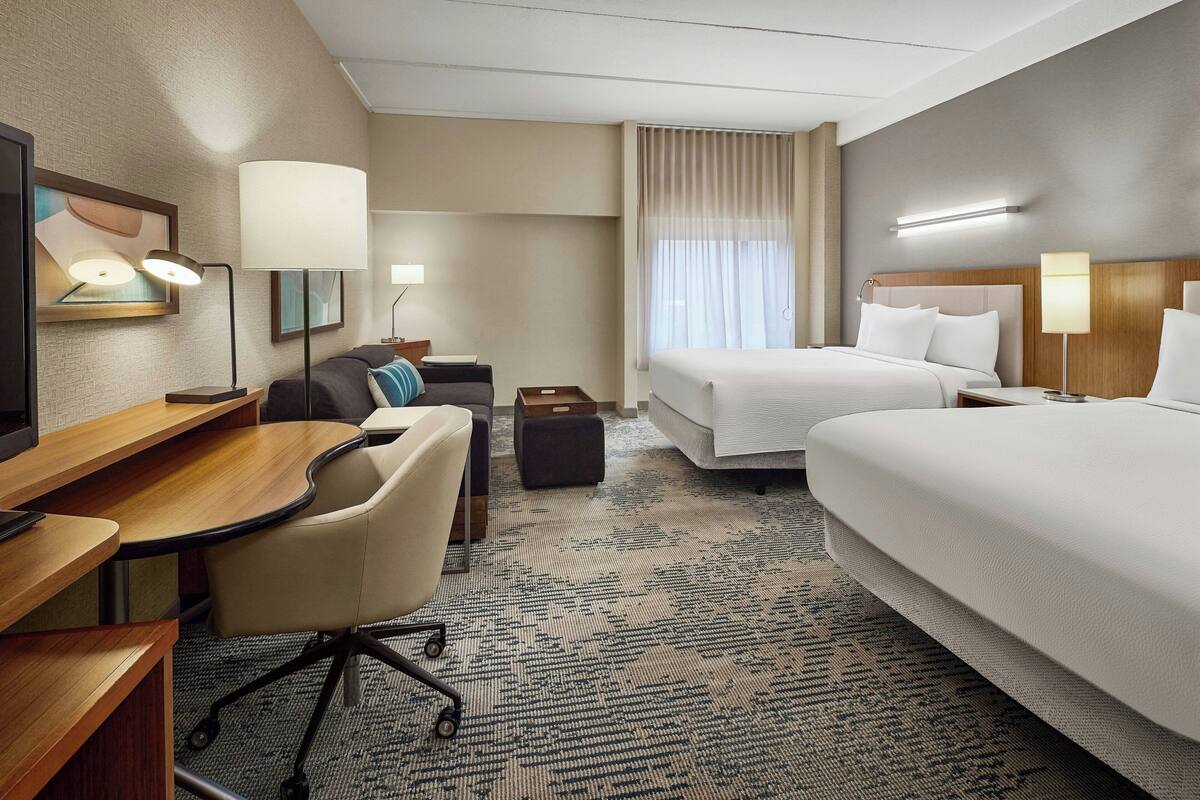 Hypo-allergenic bedding, pillow-top beds, in-room safe, desk