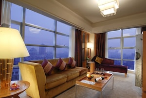 Sunny Suite | Living area | TV
