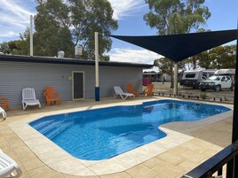 Outdoor pool, pool umbrellas, sun loungers