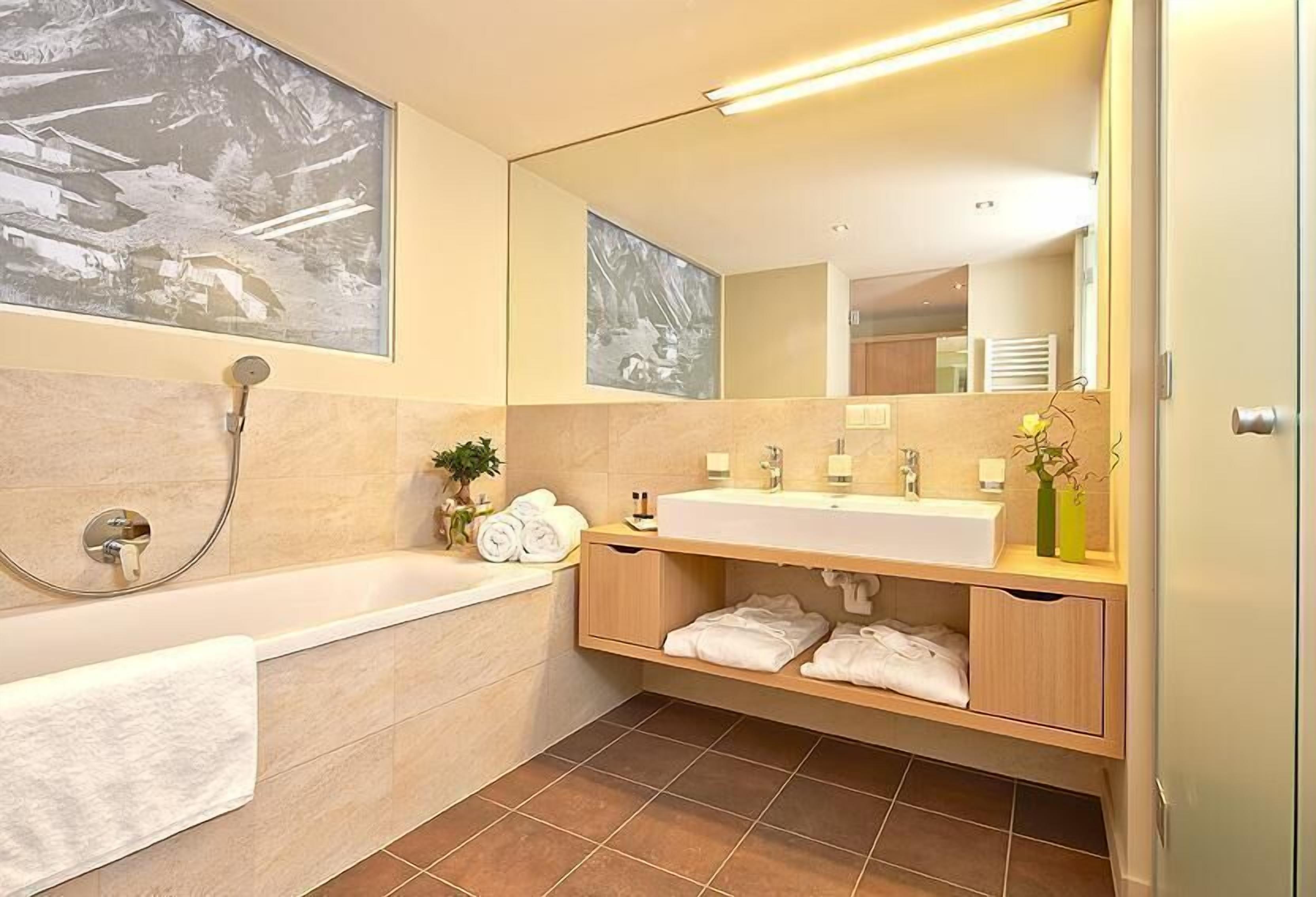 rainfall showerhead, free toiletries, hair dryer, bathrobes