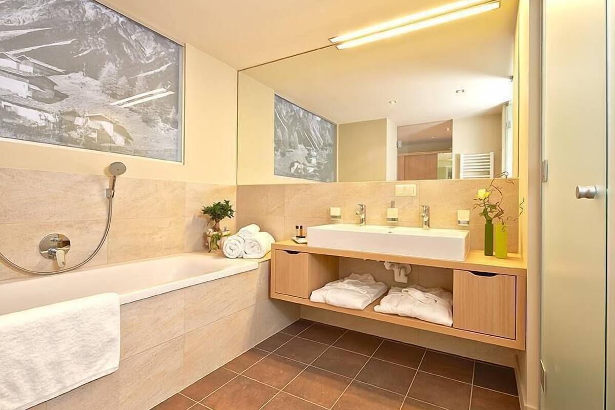 rainfall showerhead, free toiletries, hair dryer, bathrobes