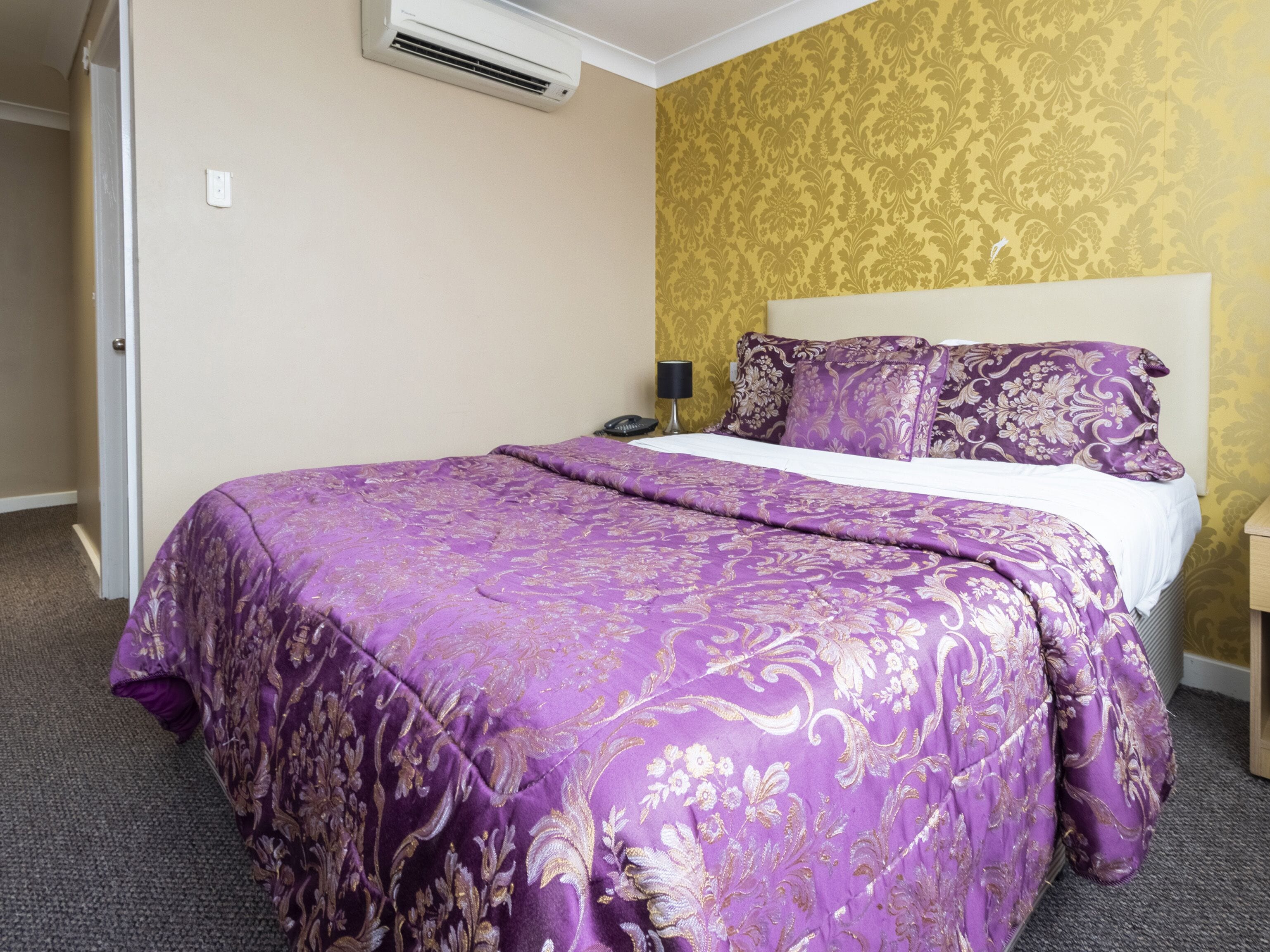 standard triple room, multiple beds | desk, iron/ironing board, bed sheets