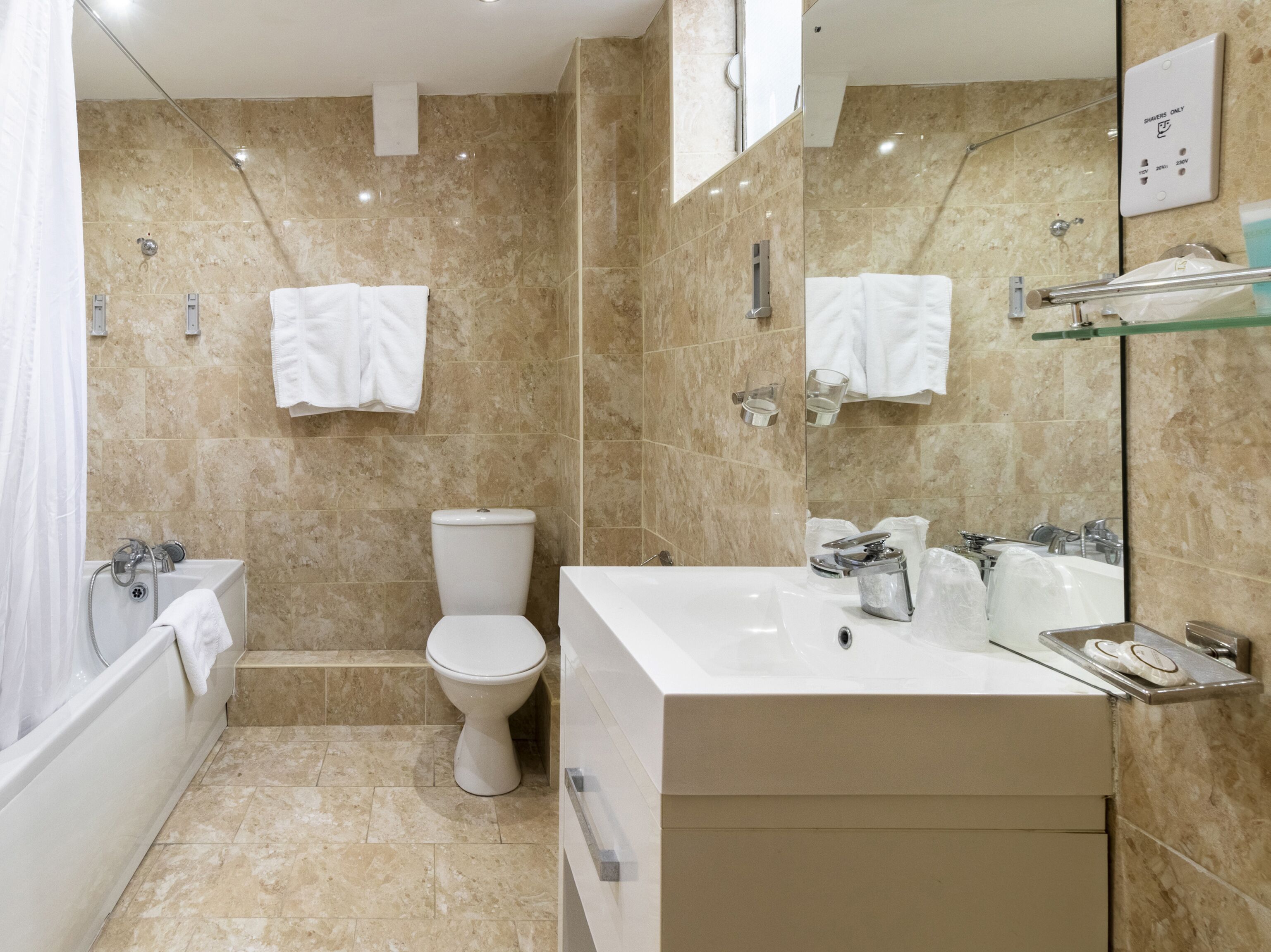 standard quadruple room, 2 double beds | bathroom | combined shower/bathtub, free toiletries, hair dryer, towels