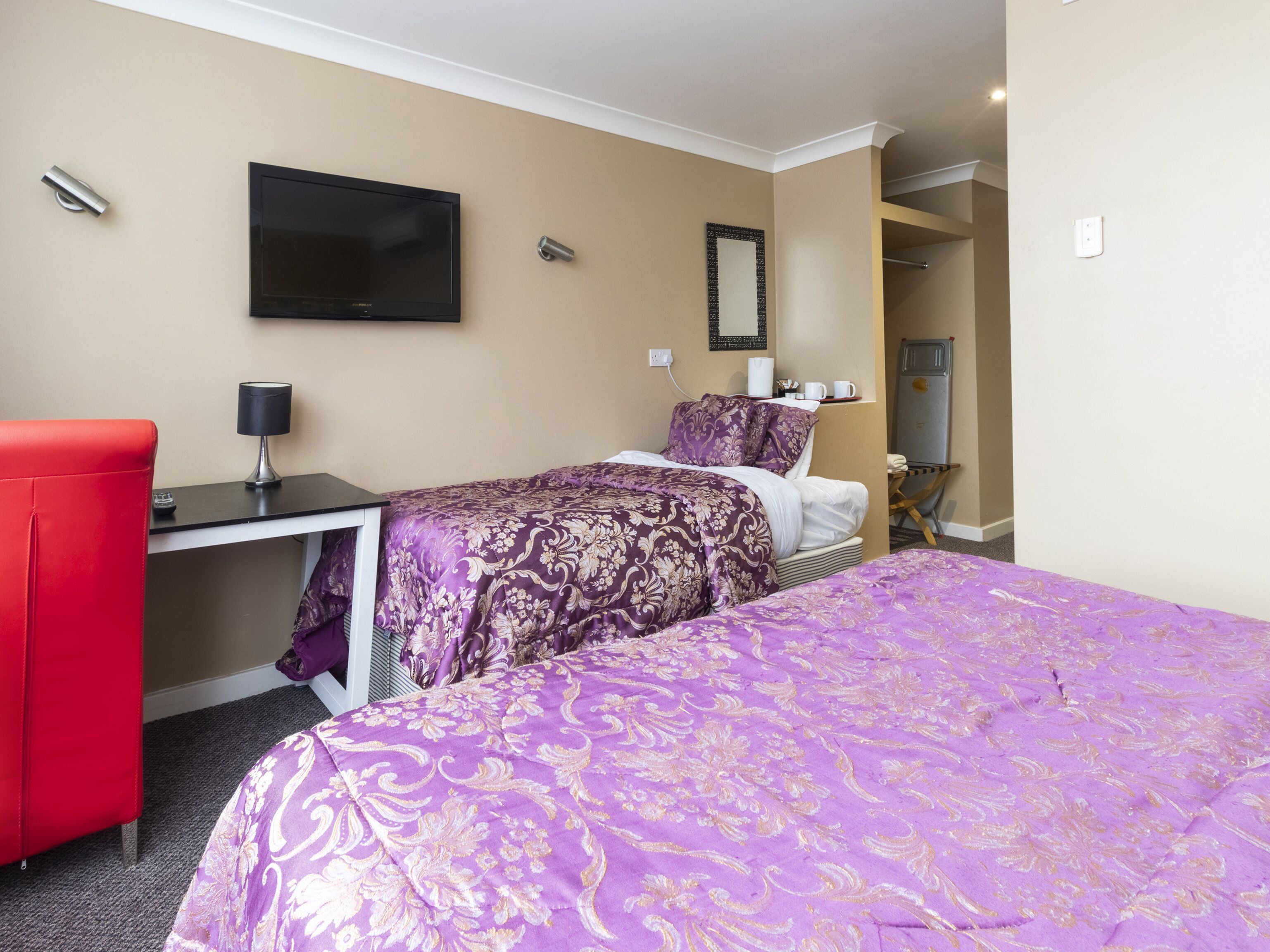 standard triple room, multiple beds | desk, iron/ironing board, bed sheets