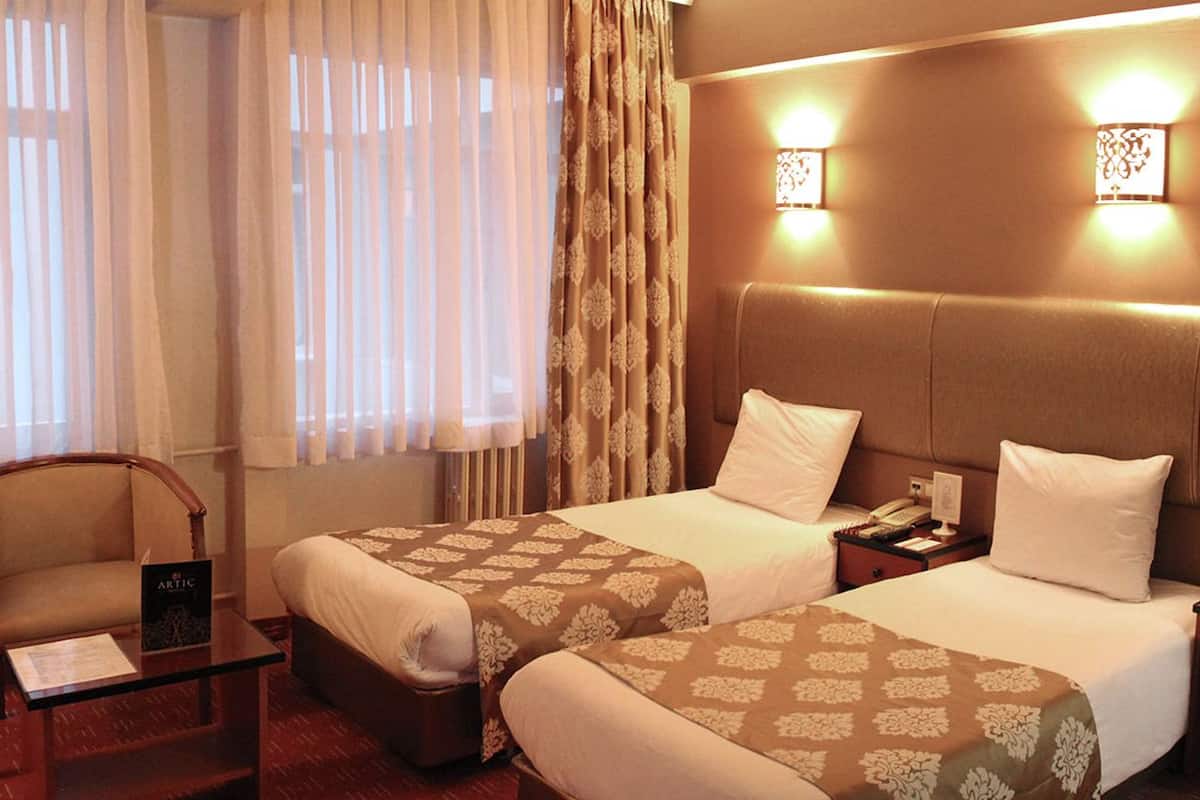 Lakens van Egyptisch katoen, luxe beddengoed, een minibar