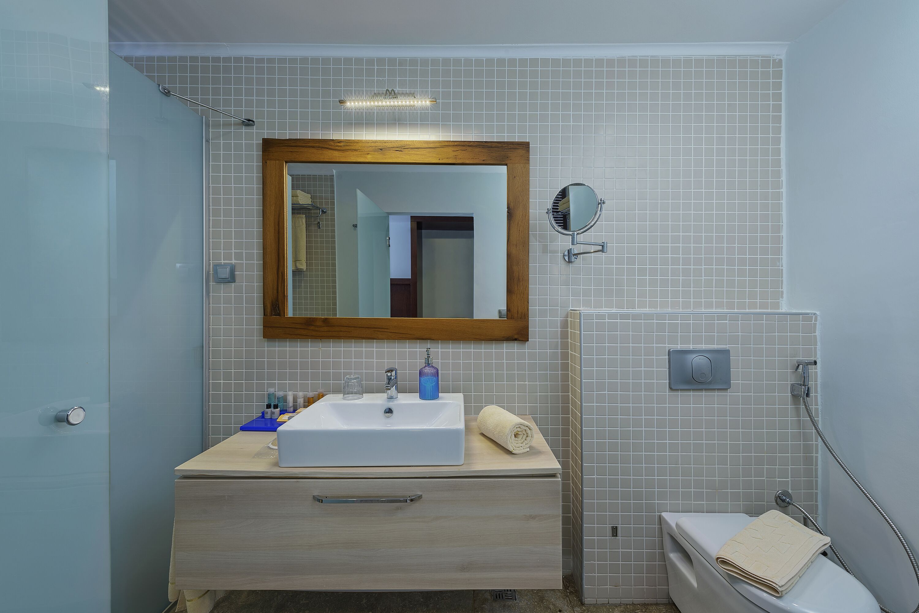 shower, designer toiletries, dressing gowns, slippers