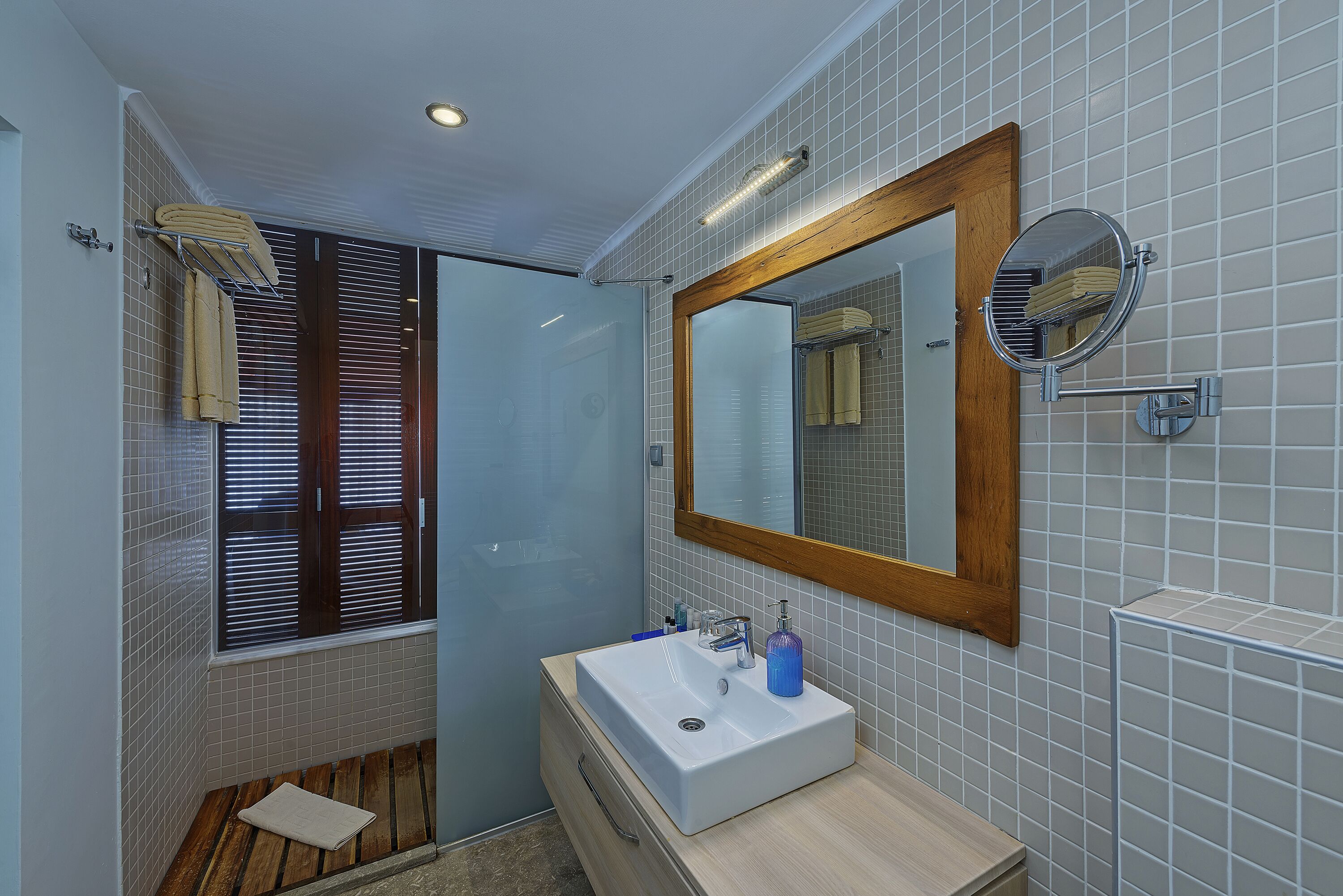 shower, designer toiletries, dressing gowns, slippers