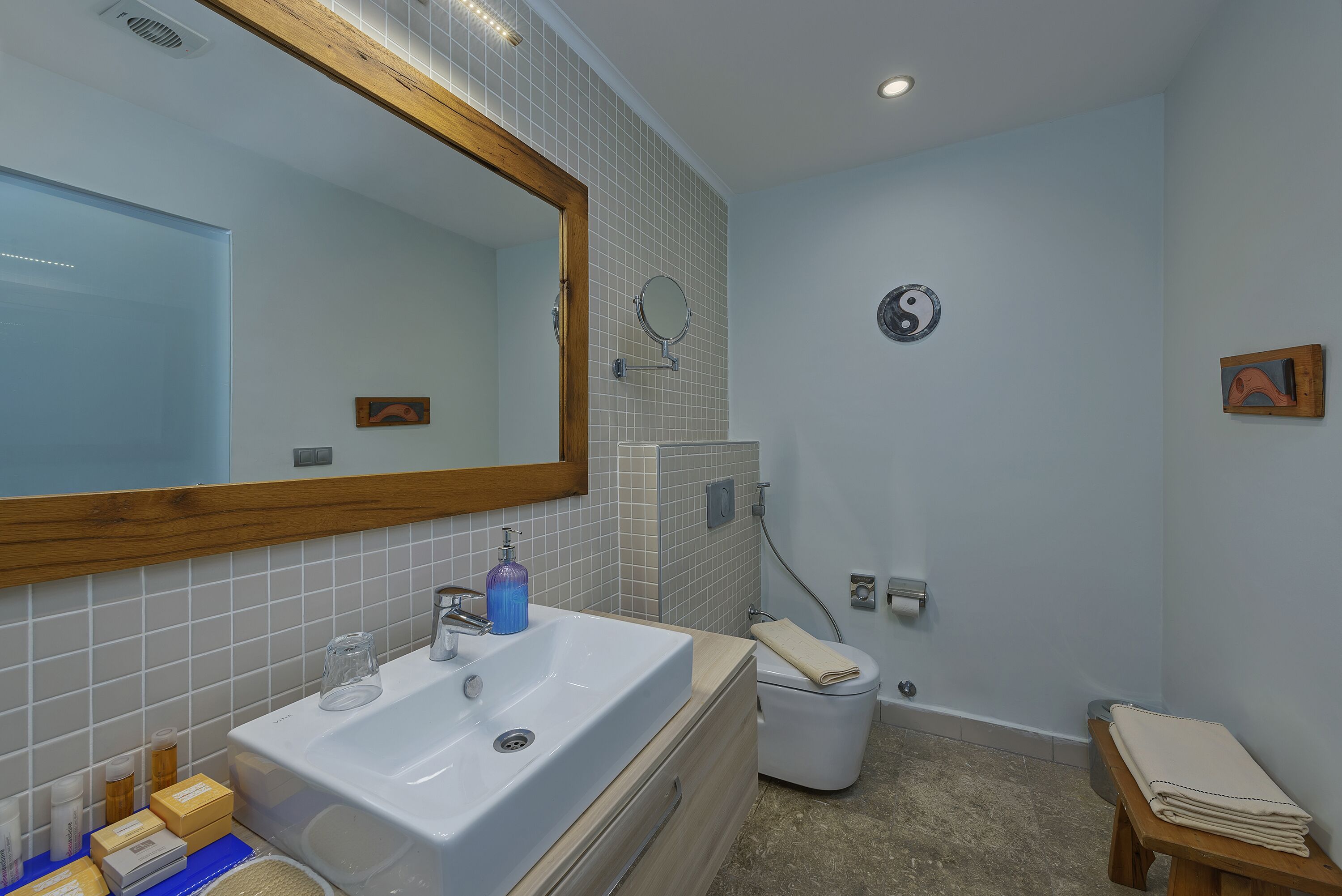 shower, designer toiletries, dressing gowns, slippers