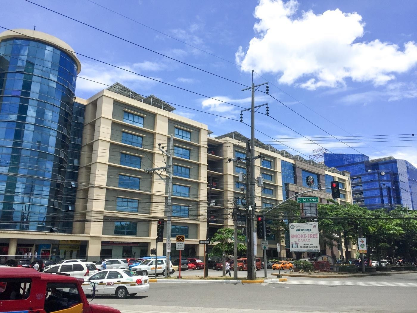 A multi-story hotel with a modern facade, large windows, and a prominent entrance.