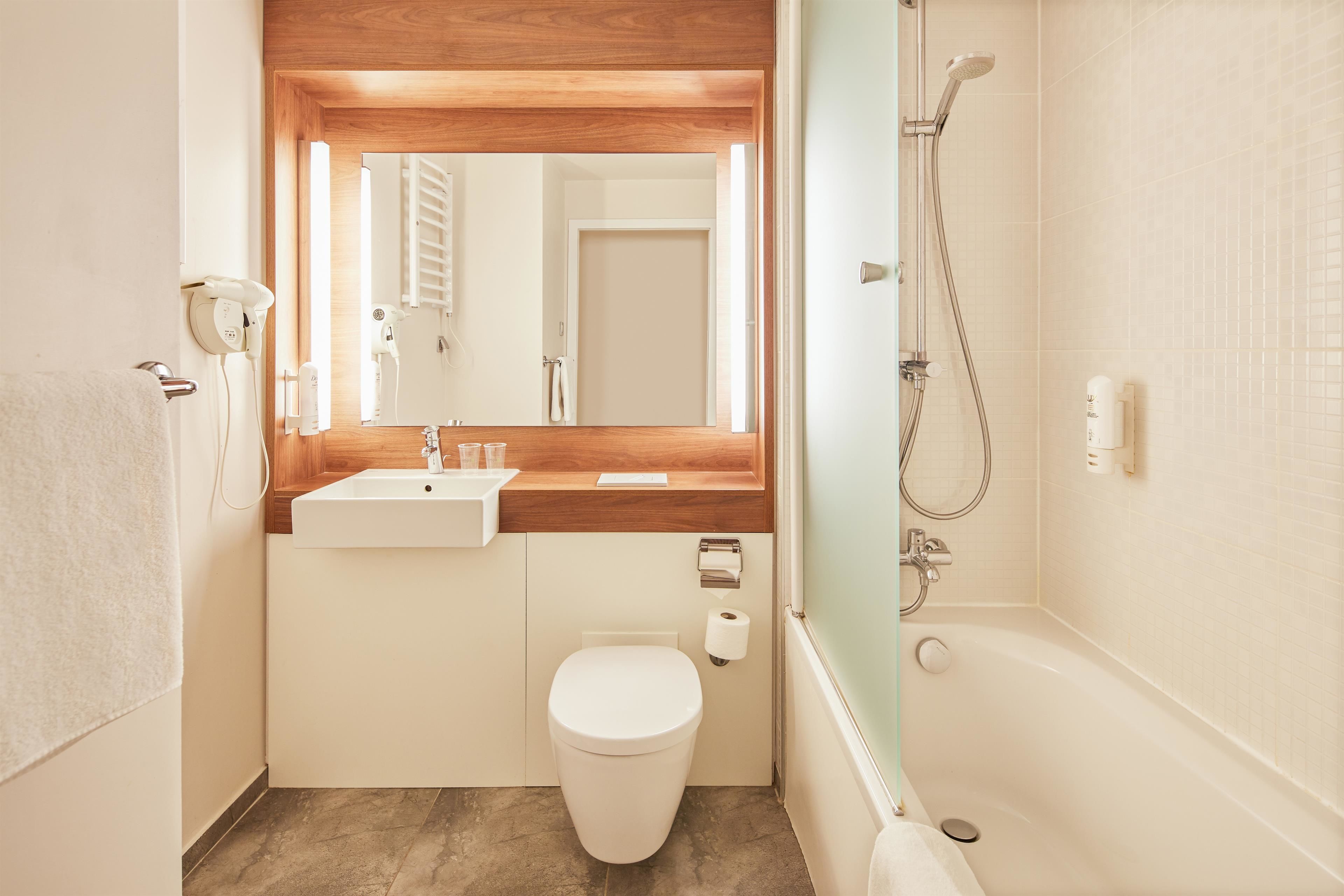 eco-friendly toiletries, hair dryer, towels