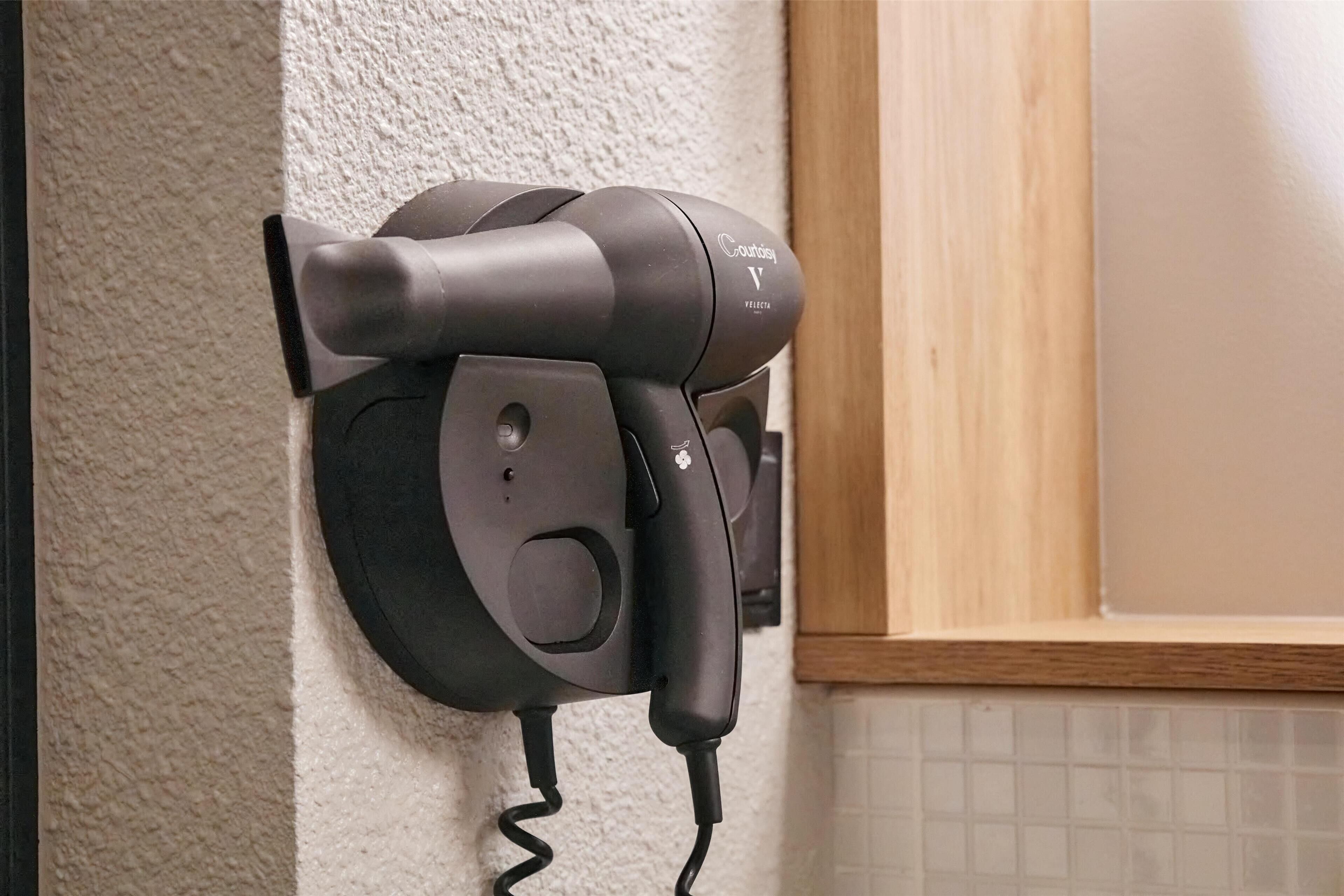 eco-friendly toiletries, hair dryer, towels