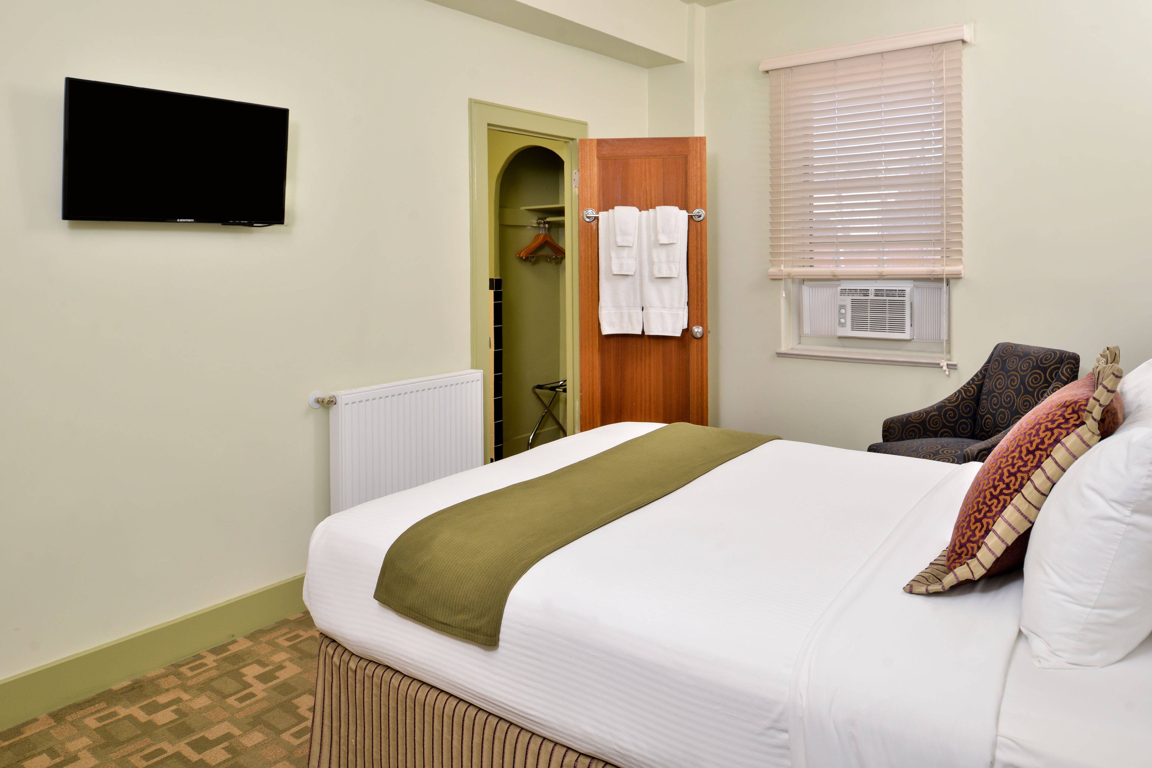 premium bedding, desk, laptop workspace, free wifi