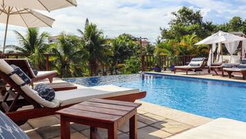 Outdoor pool, pool umbrellas, pool loungers