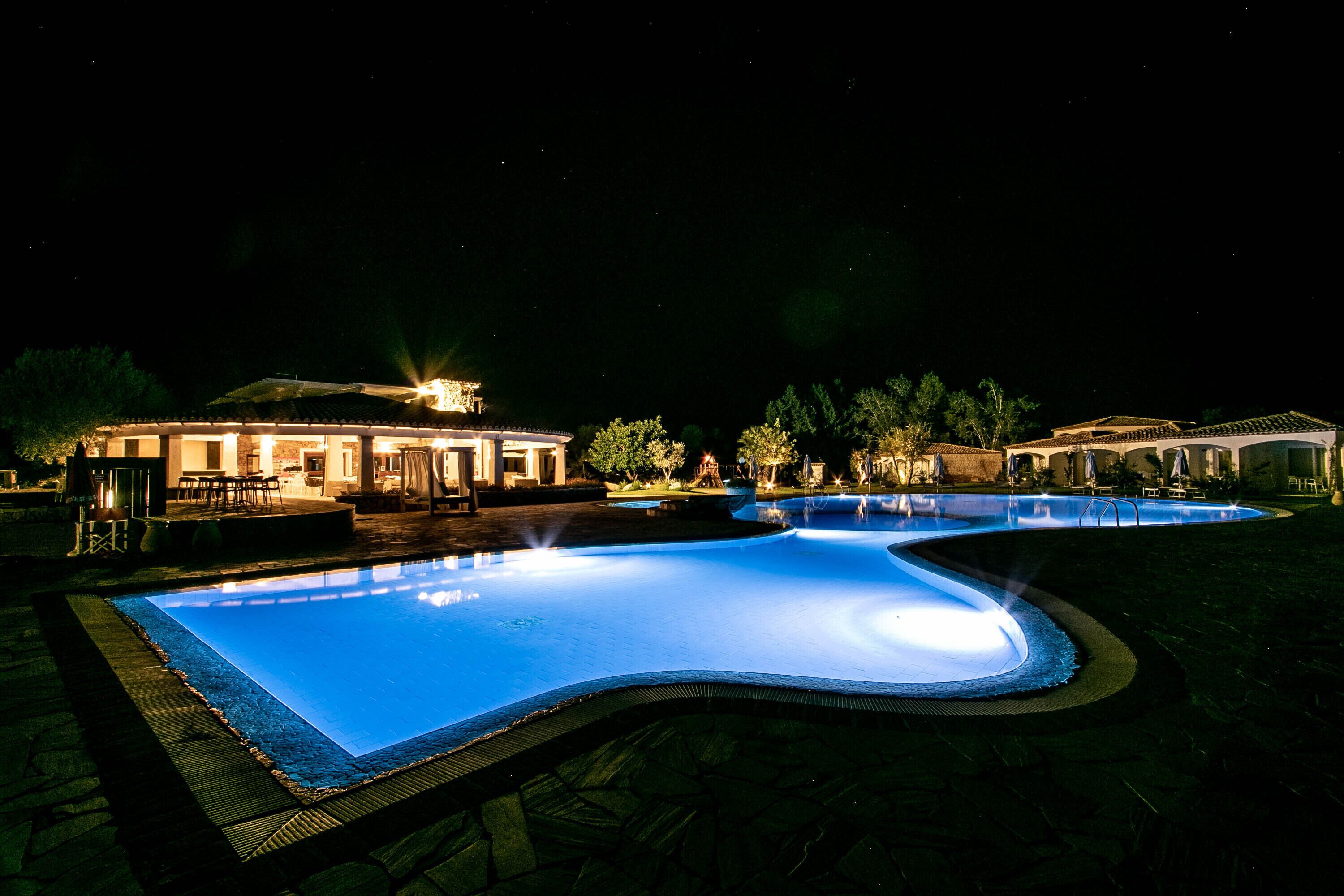 seasonal outdoor pool, pool umbrellas, pool loungers