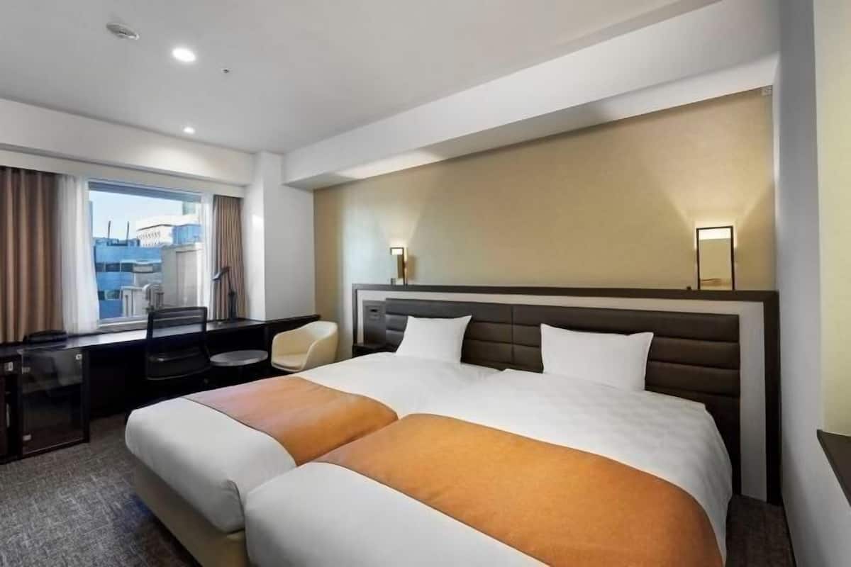 Desk, blackout curtains, free WiFi, bed sheets